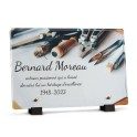 Plaque avec outils pour la tombe d'un artisan